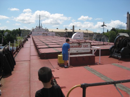 children touring an old Great Lakes freighter