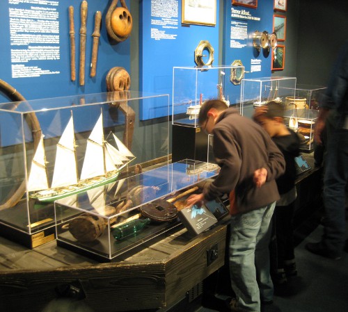 looking at the exhibits inside the Great Lakes Shipwreck Museum