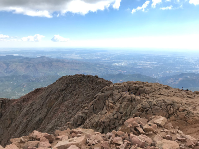 image of people rock scrambling at Pike's Peak in Colorado Springs