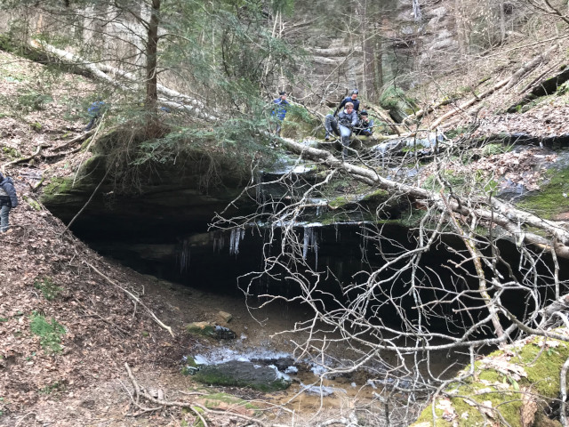 image of a small cave in the State Rockclimbing and Rappelling Area in Hocking Hills Ohio