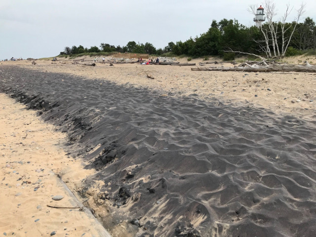 picture of the black sand at the beach in Whitefish Point Michigan