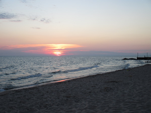 image of the sunset on Lake Michigan at the beach of Maranatha Bible and Missionary Conference in Norton Shores, MI