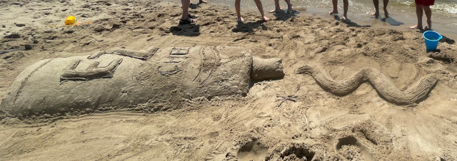 image of sand sculpture of a spray can of easy cheese at Maranatha Bible and Missionary Conference in Norton Shores