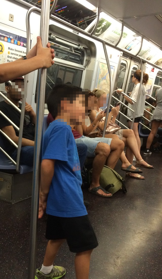 photo of people on the NYC subway