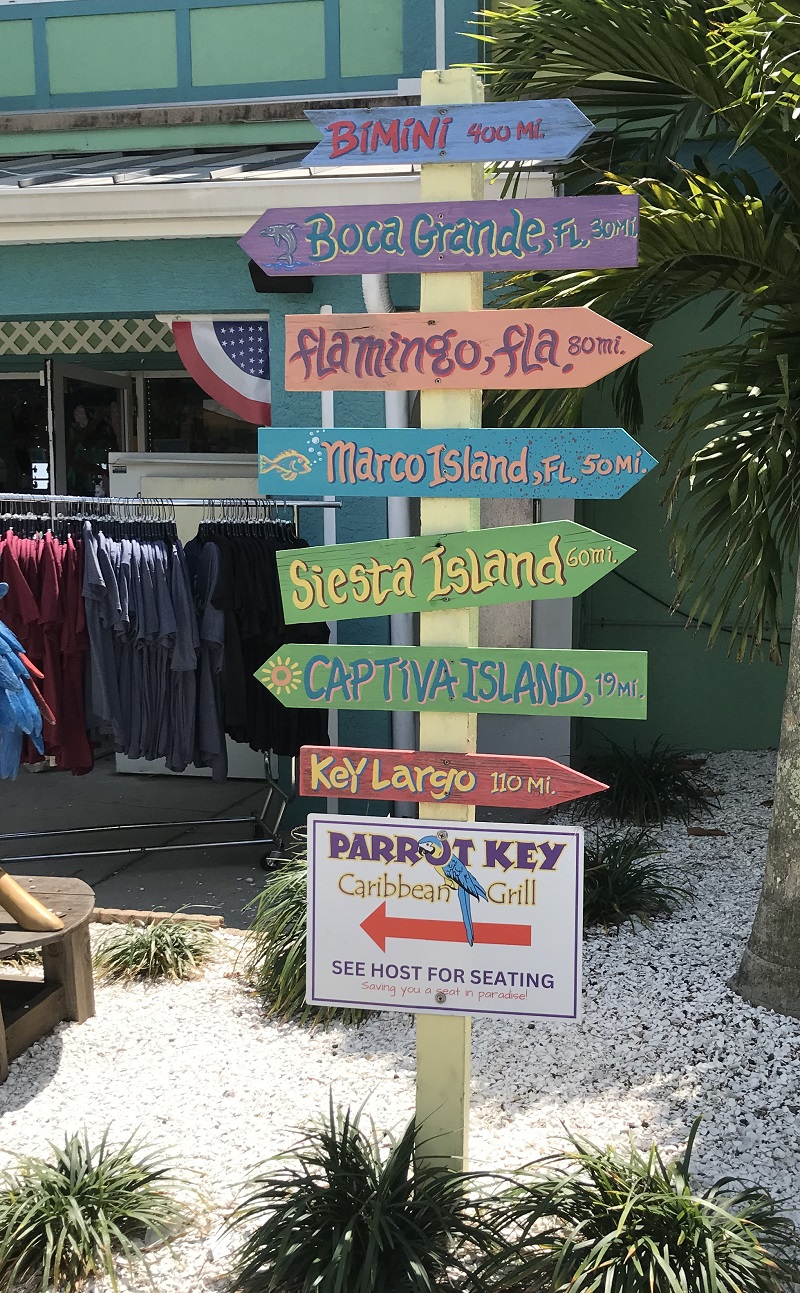 image of a sign at Parrot Key Caribbean Grill in Florida