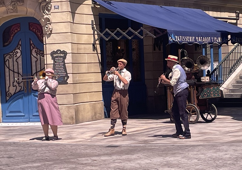 image of a musical trio street performer band at Harry Potter Ministry of Magic World at Universal Studios Epic Universe