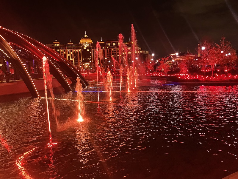 image of the fountain light show at Universal Studios Epic Universe at night